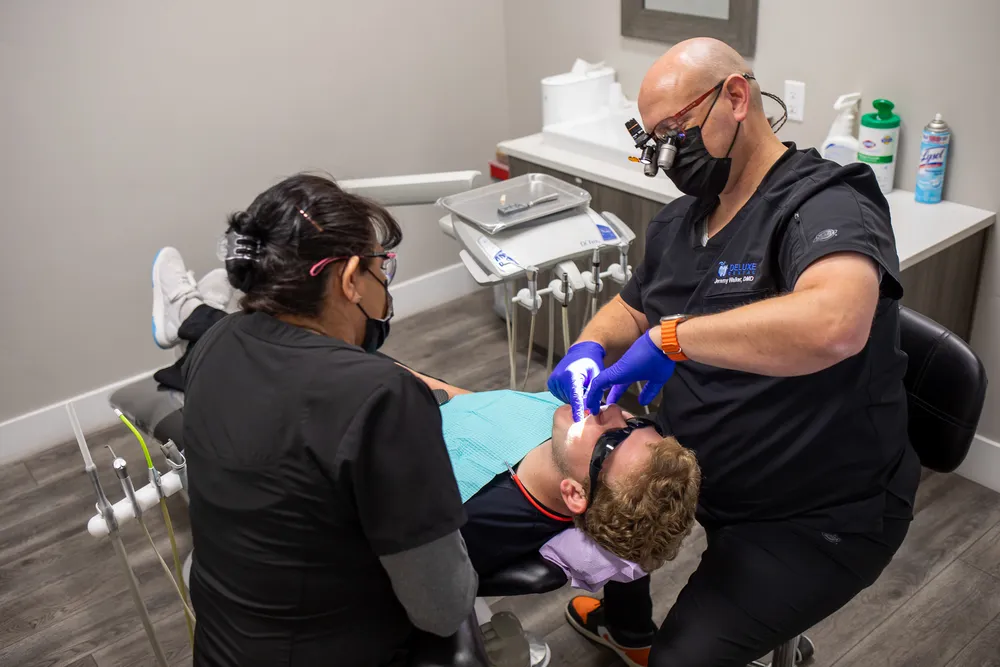 Dr. Jeremy Walker performing same-day dental treatment — Deluxe Dental Kuna Idaho dentist
